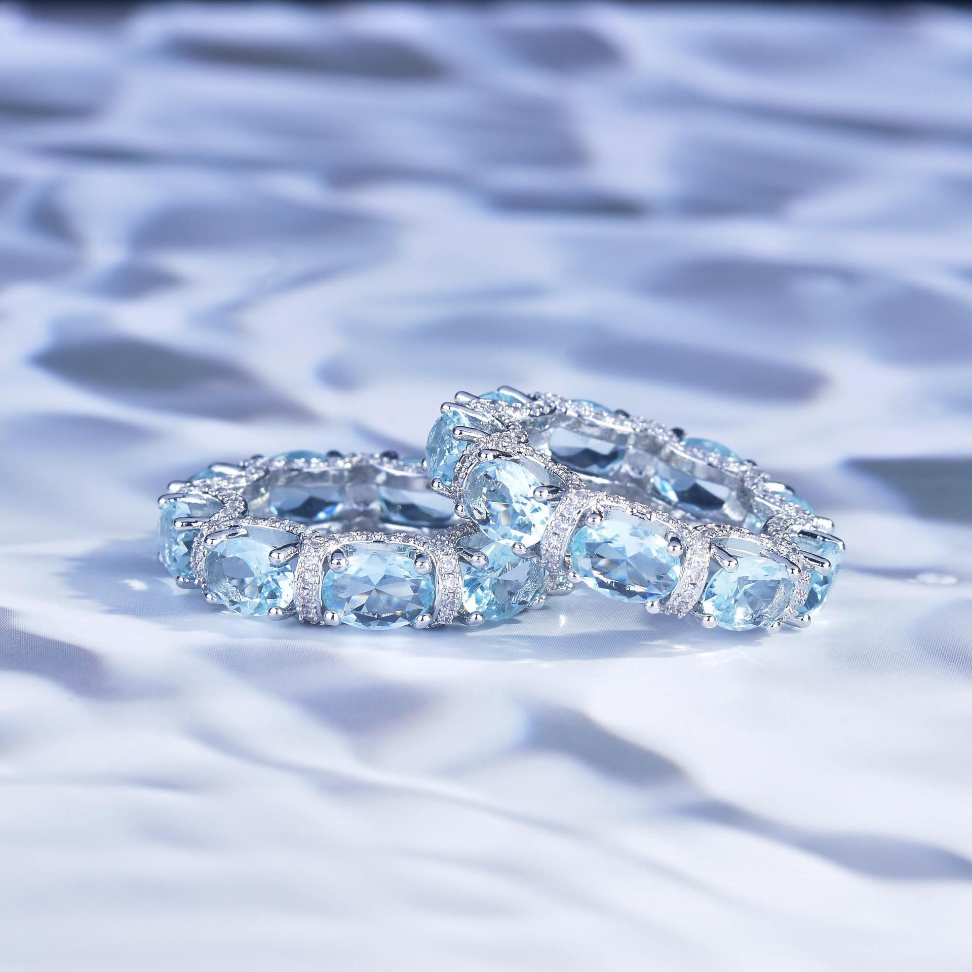 Luxury Oval Cut Aquamarine Eternity Band Ring, Micro Pave Blue Gemstone Stackable Ring For Women - Image 4
